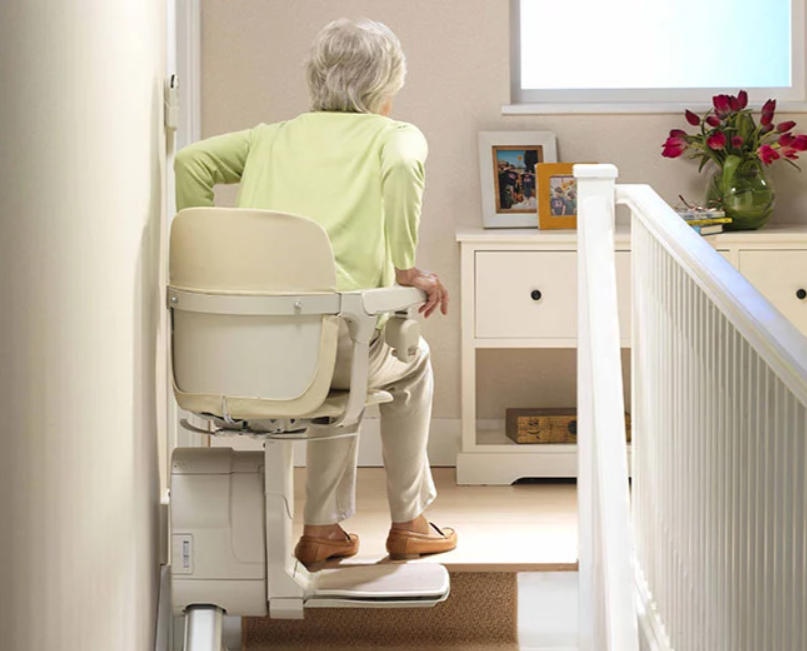 Woman on Stairs with Chair Lifts and Stairlifts in Buffalo, Rochester, Erie, Ithaca, New York